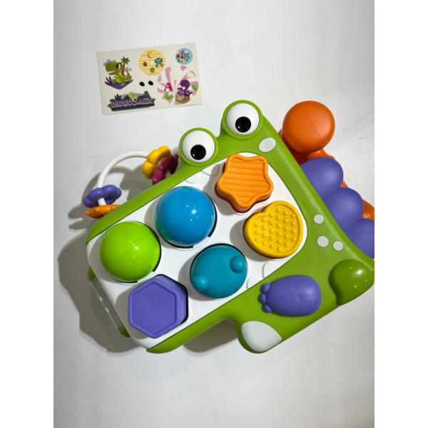 Сортер "Динозавр" QX-91210E, фігури 6шт (4шт-брязкальце, 2шт-кульки), молоточок (QX-91210E)